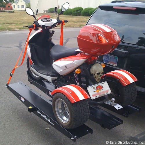 VersaHaul Trike Scooter carrier loaded with trike on back of suv angled view